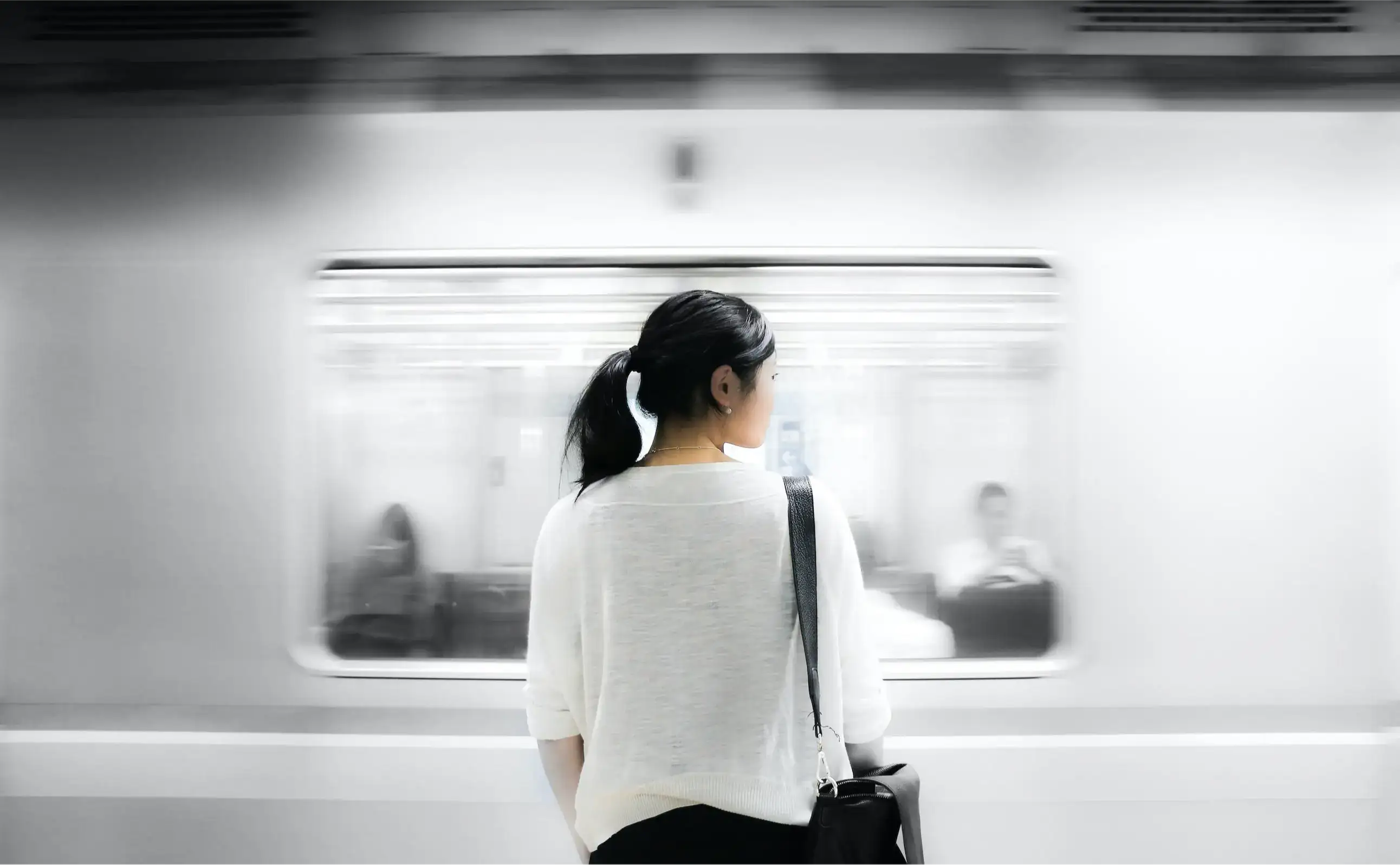 a woman near subway train